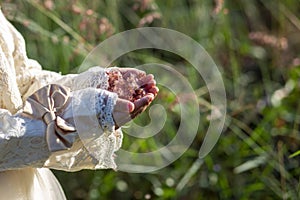 The grass hairs in the hands of Asian girls in the evenings look warm and soft, the idea of Ã¢â¬â¹Ã¢â¬â¹enjoying the small things around